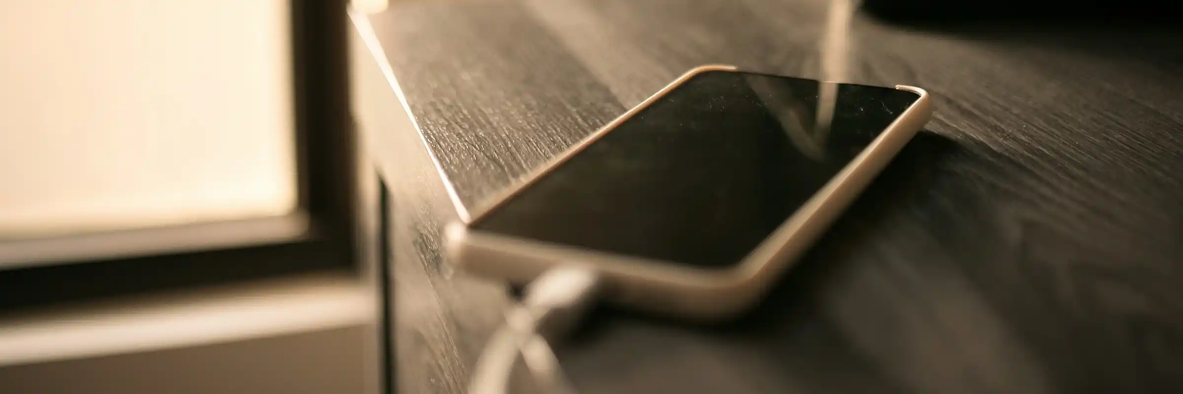 Sahuarita Mission cell phone on table by window